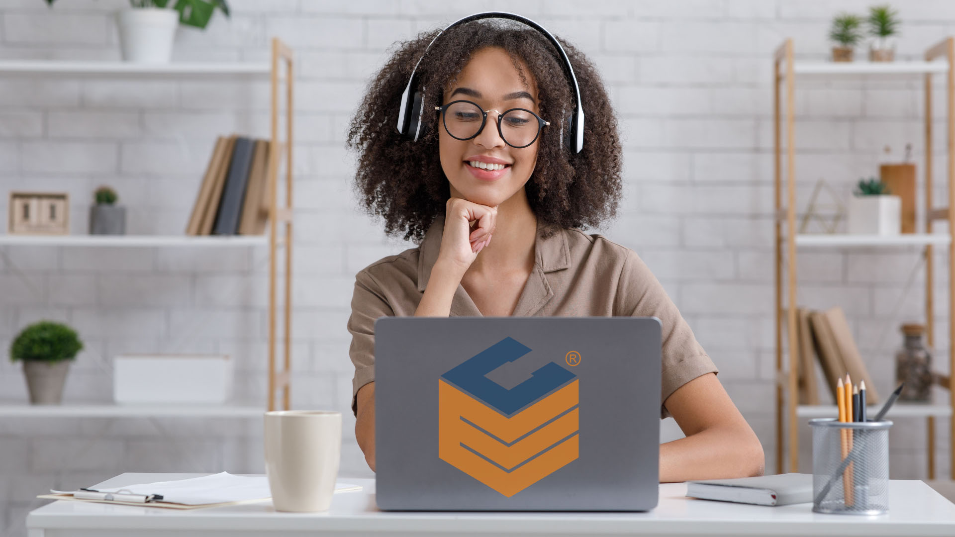 Woman taking CompEssentials online course